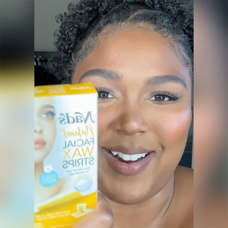 Lizzo removes hair using Nad's Natural Hair Removal Facial Wax Strips